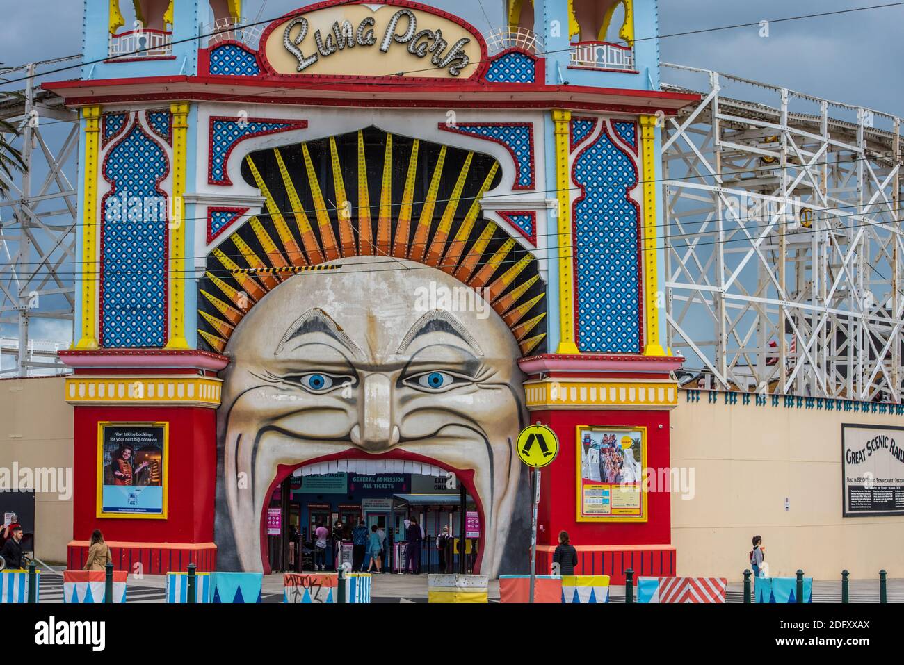 melbourne-australia-06th-dec-2020-front-entrance-with-qr-code-registration-temperature-check-and-ticket-booth-at-the-luna-parkmelbournes-iconic-outdoor-entertainment-venue-luna-park-opened-its-doors-to-visitors-.jpg